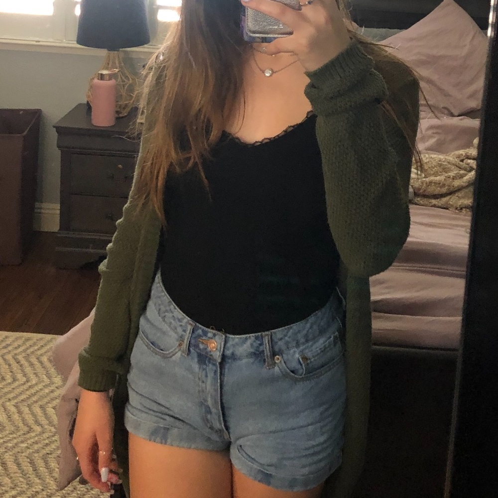 Green cardigan, butt length, thin but is cozy